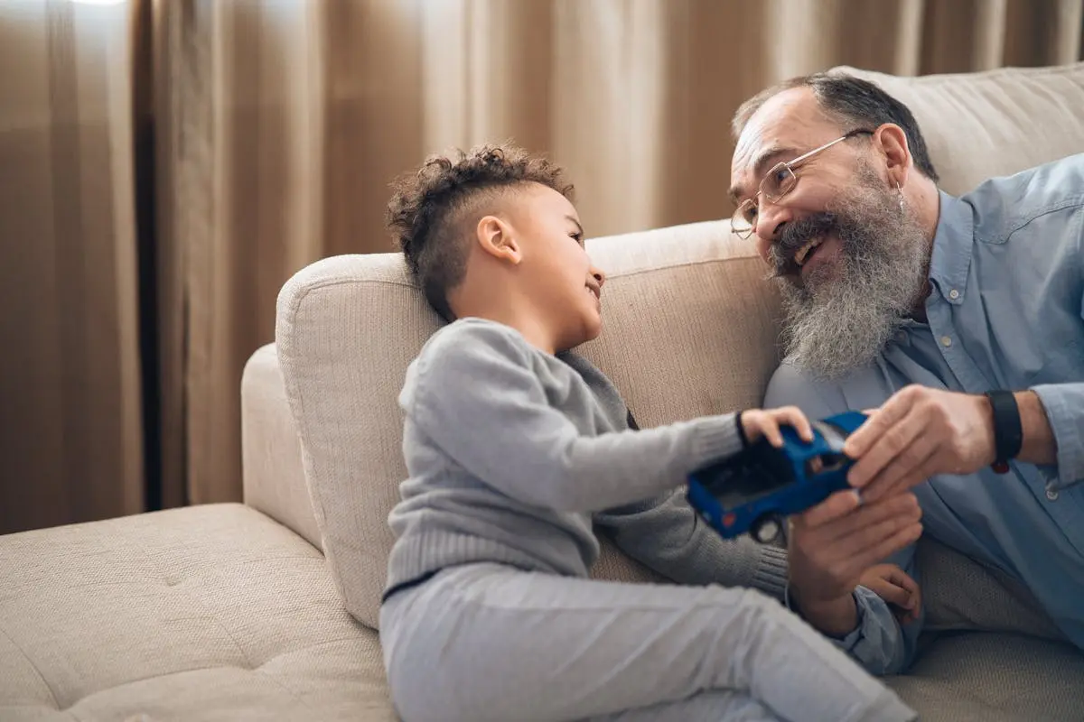 Multi-generational family enjoying a conversation, illustrating hearing care at every life stage