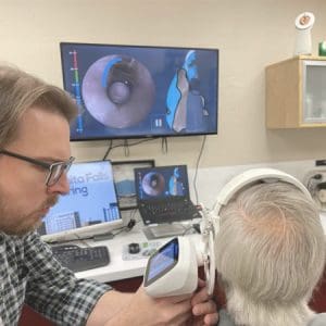 a digital ear scan being performed